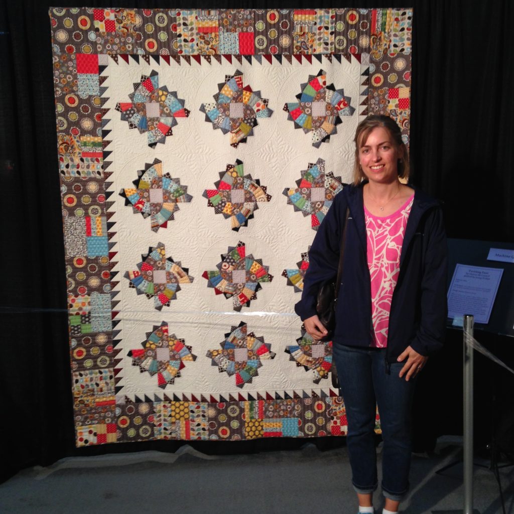 Twirling Fans Quilt at Quilt, Knit, Stitch show by Quilts, inc, MQX show portland oregon