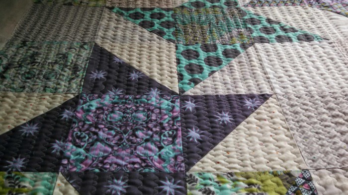 Pinwheel star quilt using tula pink fabric