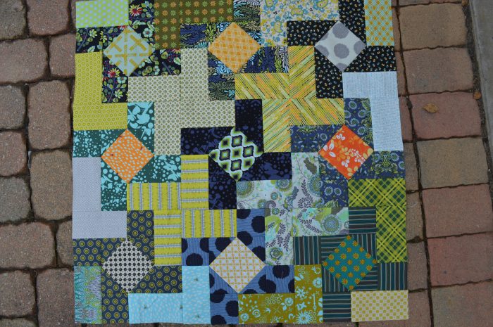 Dutch Windmill quilt by Sharon McConnell, color girl quilts, modern patchwork, pinwheel quilt with scraps