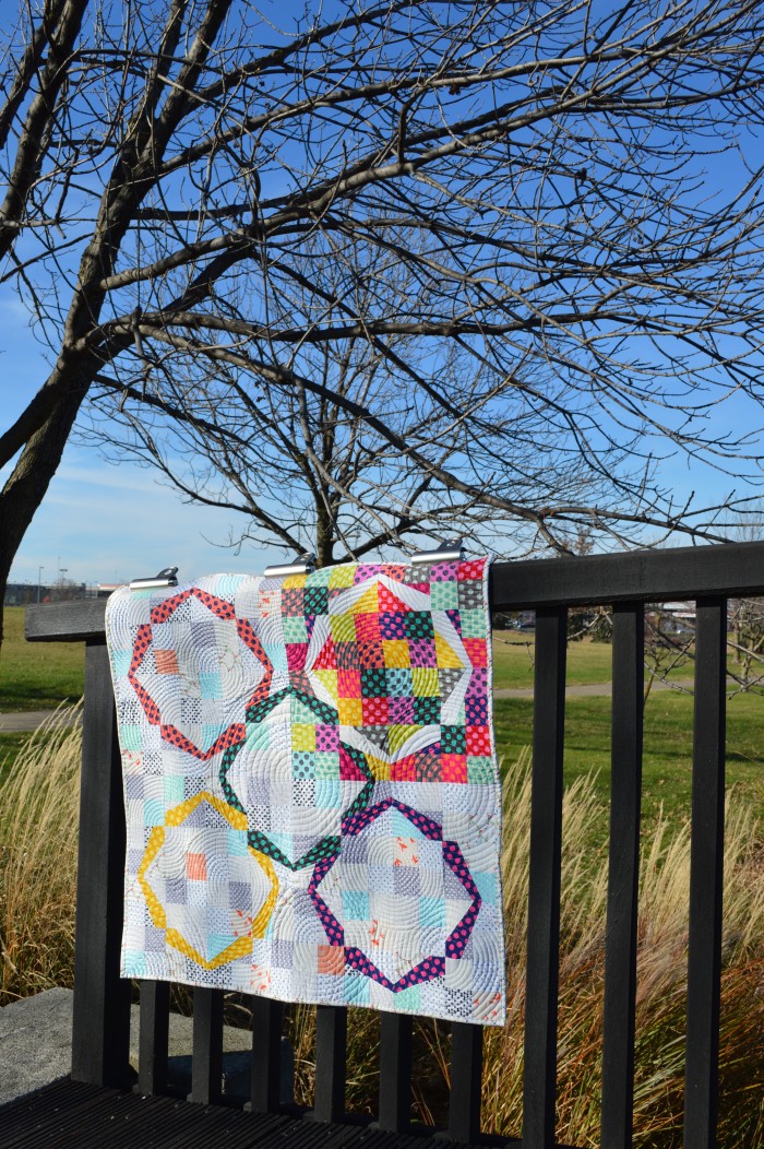 Hula Girl Quilt by Sharon McConnell, low volume, polka dot patchwork ring quilt