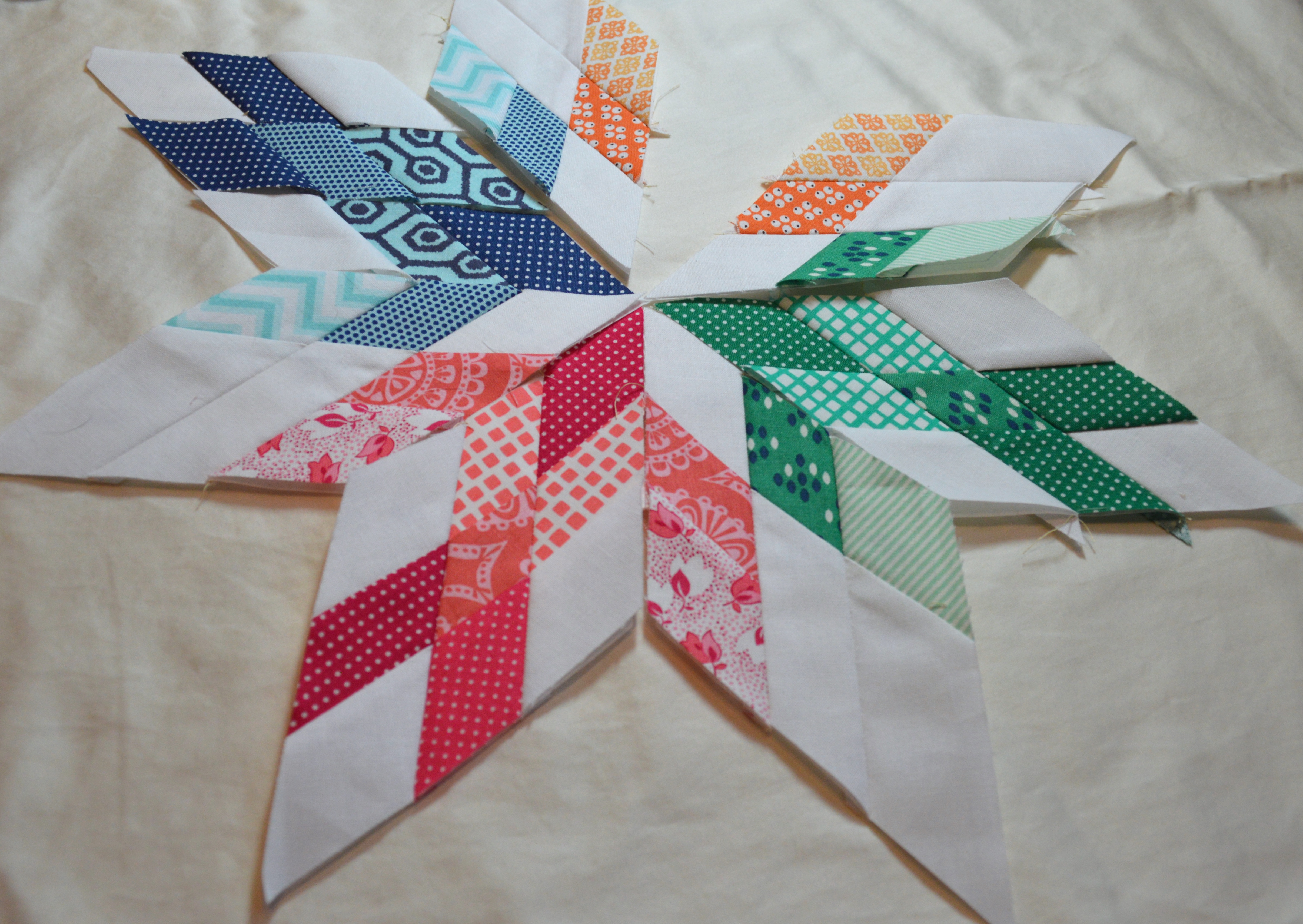 Aviatrix medallion, bird in the window quilt block, paper piecing diamonds patchwork