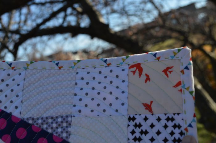 Hula Girl Quilt by Sharon McConnell, low volume, polka dot patchwork ring quilt