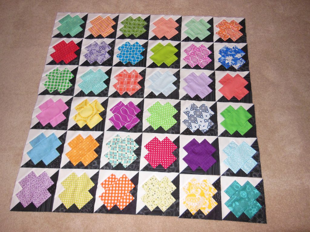 Jumping Jacks scrap quilt by Sharon McConnell easy quilting pattern