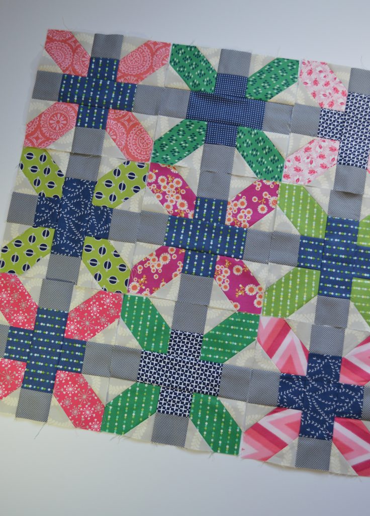 Aviatrix medallion patchwork quilt with scrappy x and plus blocks