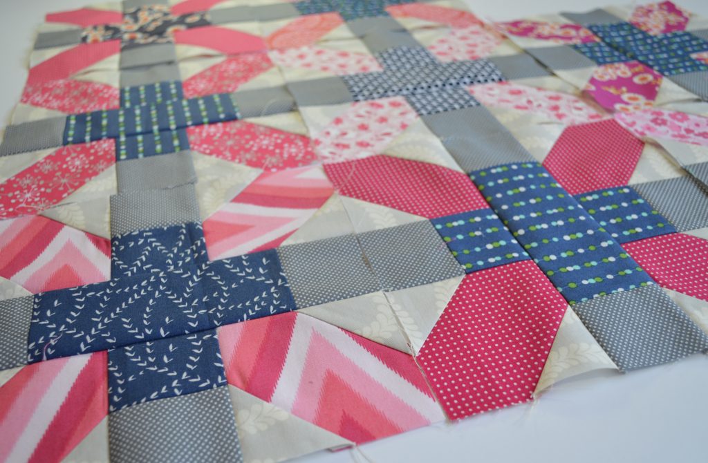 Aviatrix medallion patchwork quilt with scrappy x and plus blocks