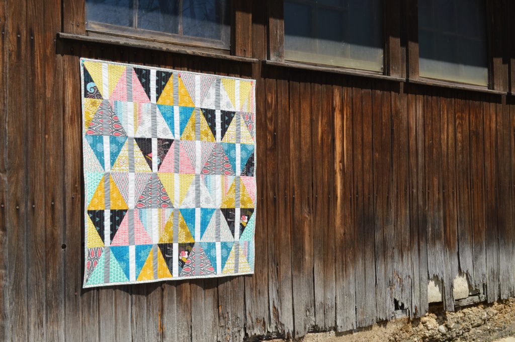 Archer Quilt by Sharon McConnell with Etno fabrics by Pat Bravo
