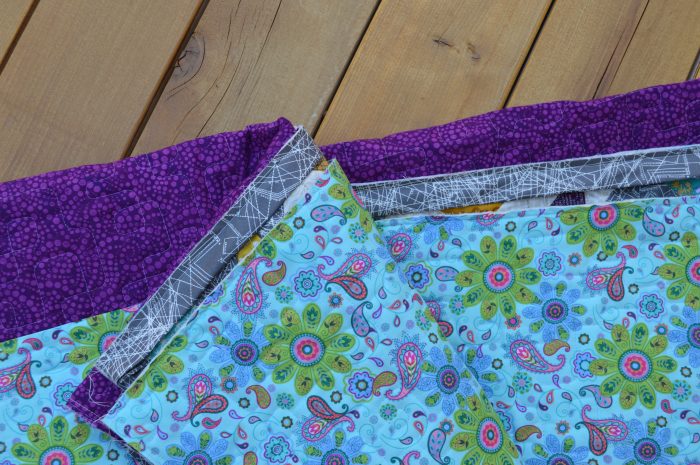 scrappy pieced quilt backing and binding