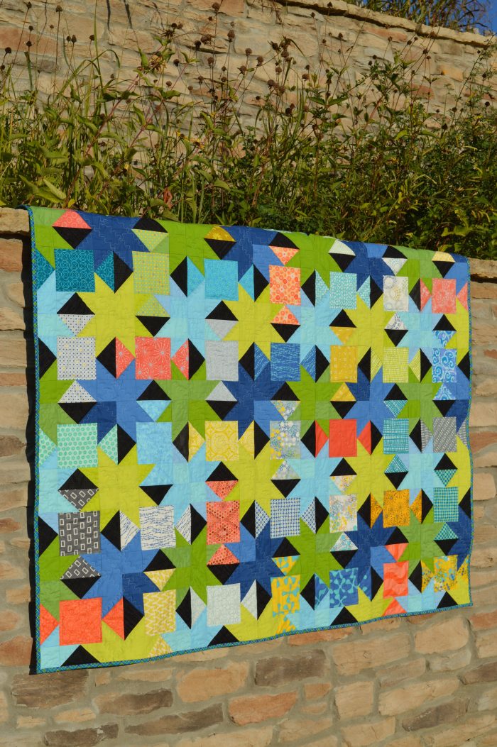 Sparkle charm square quilt by Sharon McConnell