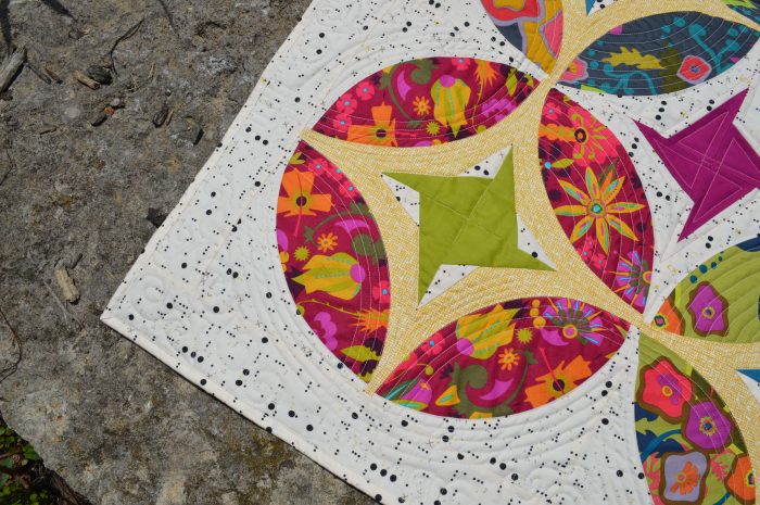 Eclipse quilt pattern, curved piecing mini quilt by Sharon McConnell