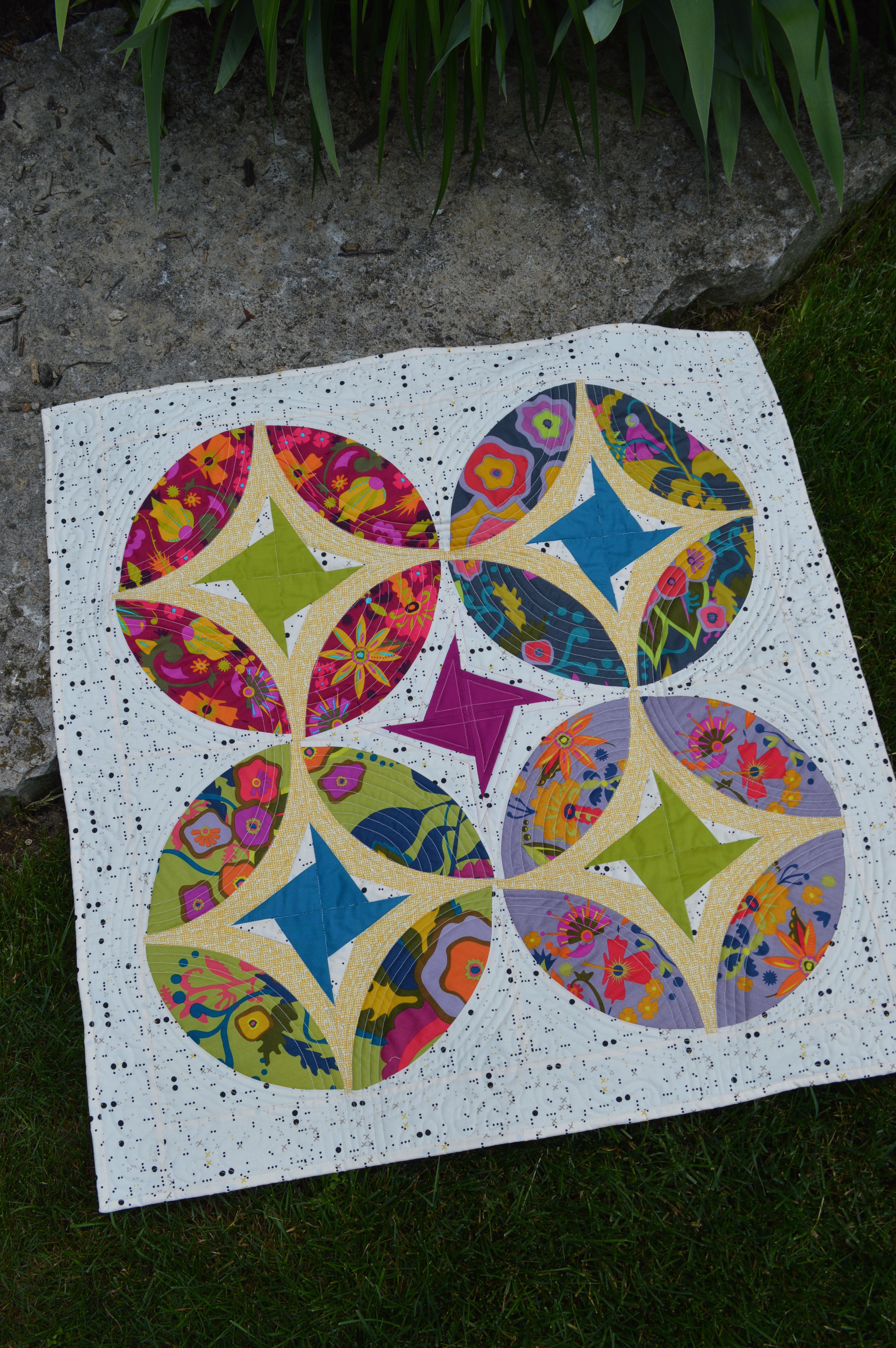 Eclipse quilt pattern, curved piecing mini quilt by Sharon McConnell