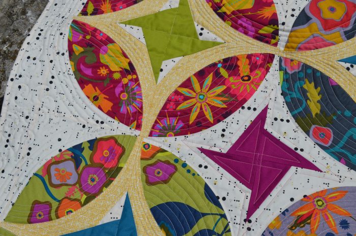 Eclipse quilt pattern, curved piecing mini quilt by Sharon McConnell
