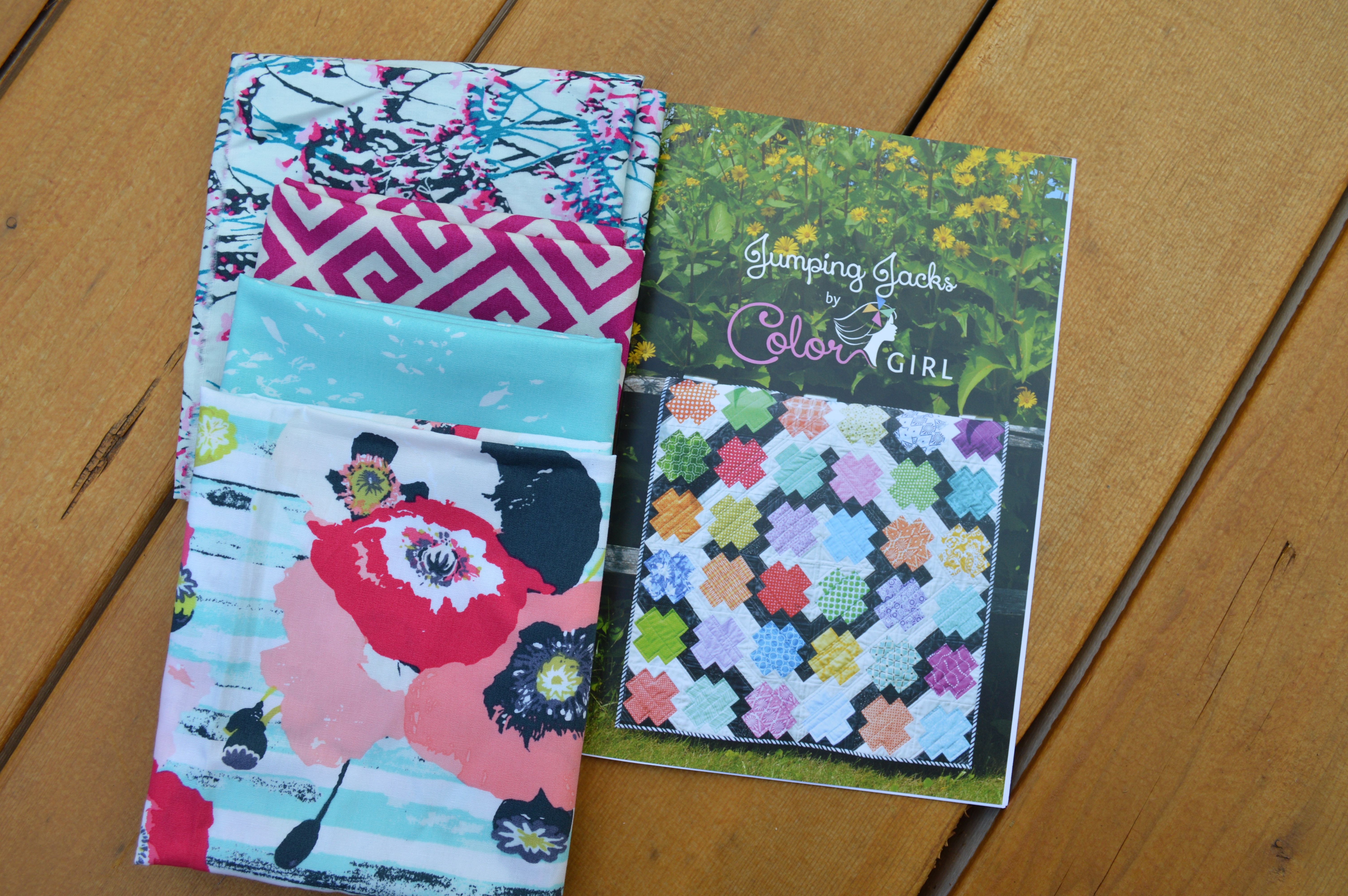 skopelos fabric by katarina roccella for art gallery fabrics with Jumping jacks pattern by Sharon McConnell