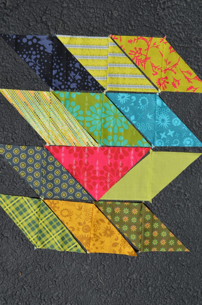 scrappy triangle quilt with Alison Glass fabrics
