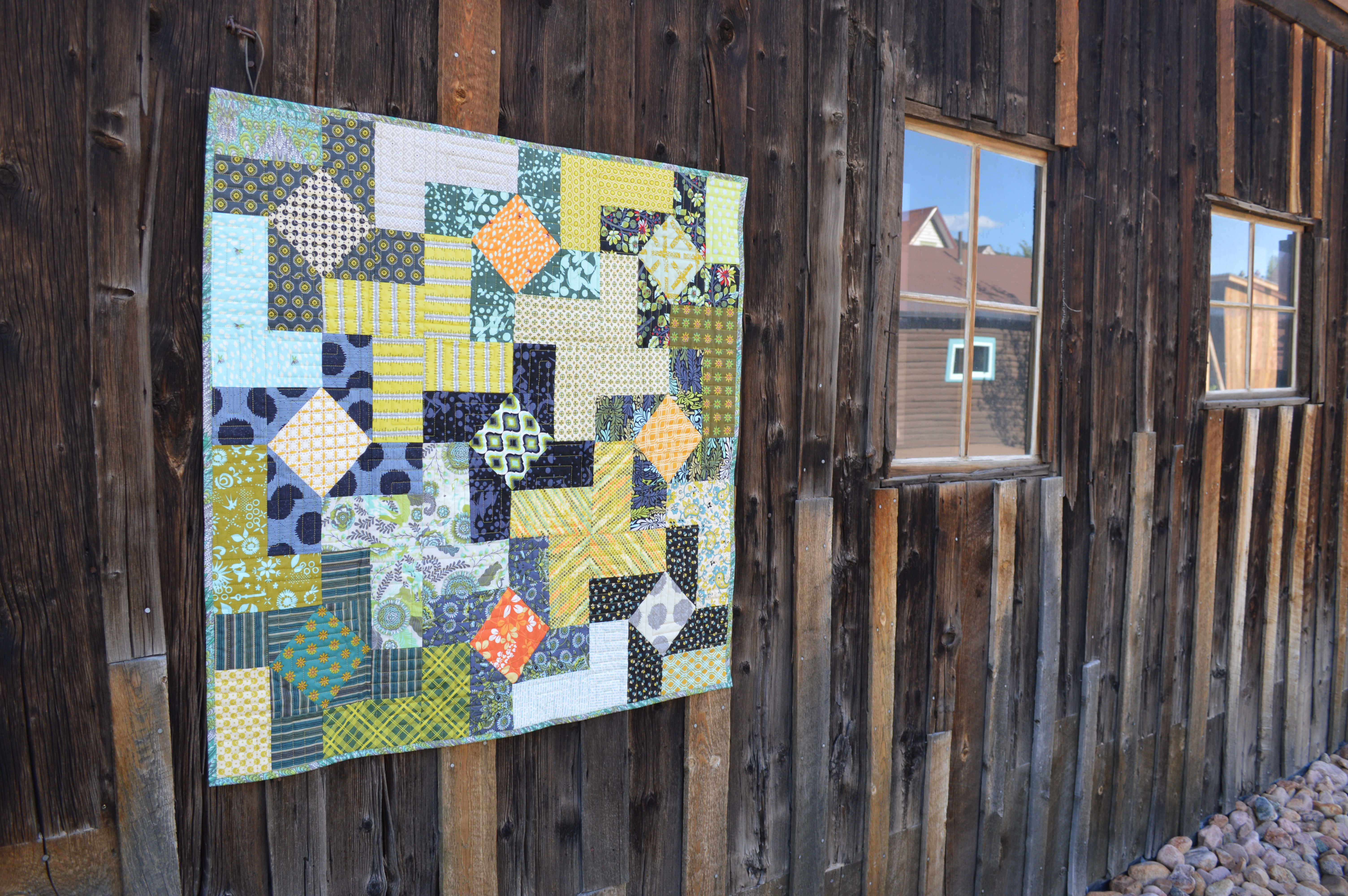 Dutch Windmill quilt pattern by color girl using Free Spirit Fabrics