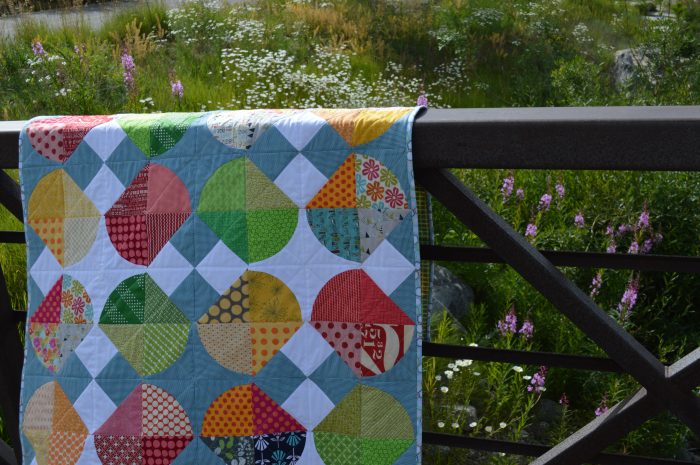 TipsyByColorGirl modern curved quilting pattern with scrappy fabrics