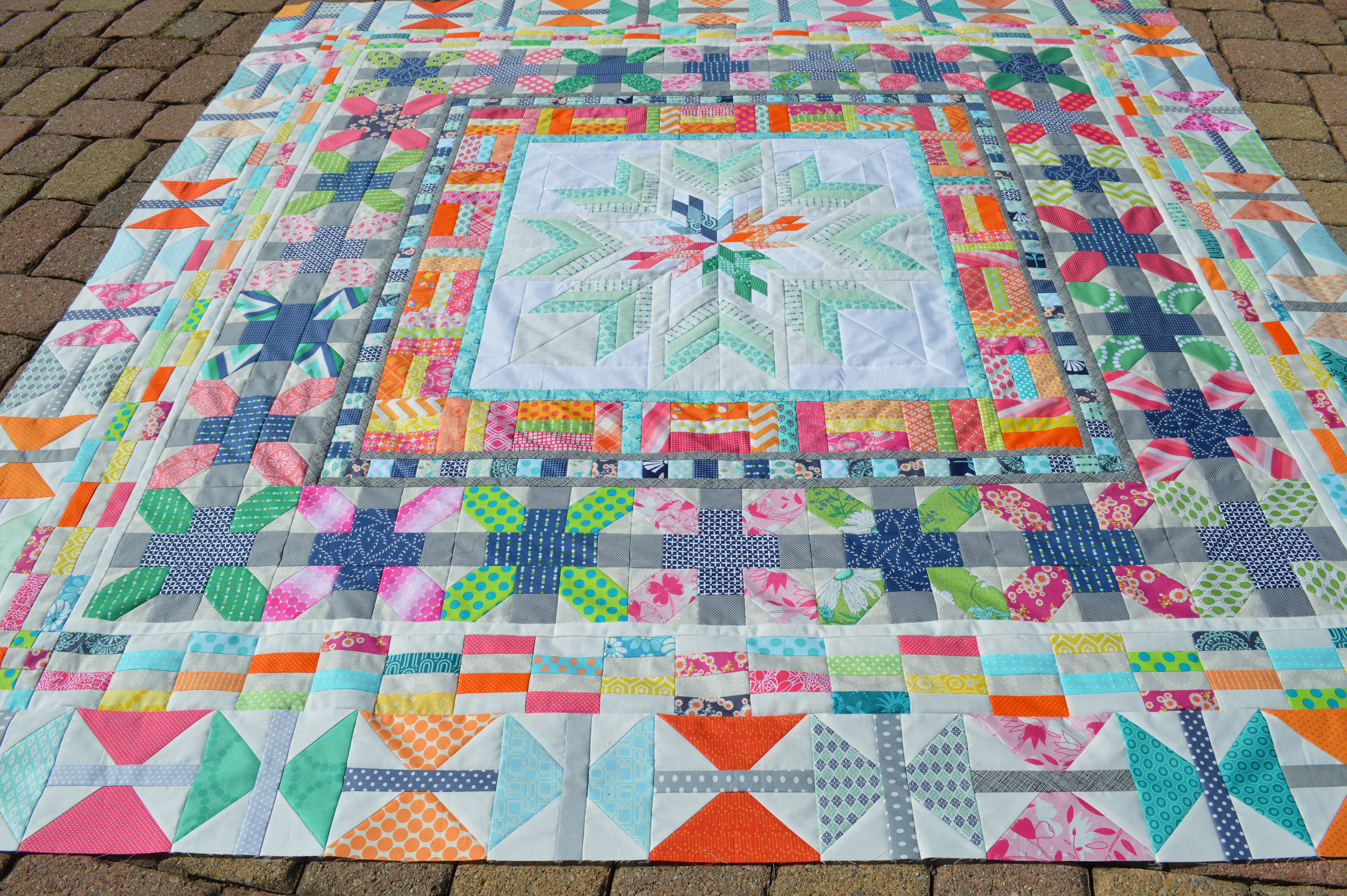 Aviatrix medallion modern patchwork quilt by Sharon McConnell