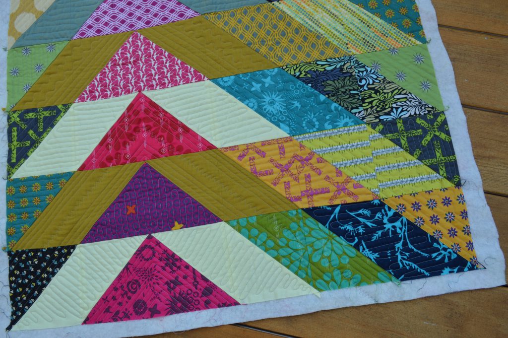 broken v modern triangle patchwork quilt by Sharon McConnell