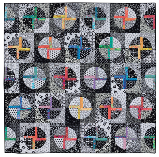 black and white and colorful quilt by Jackie Kunkel, pattern in book, "splash of color"