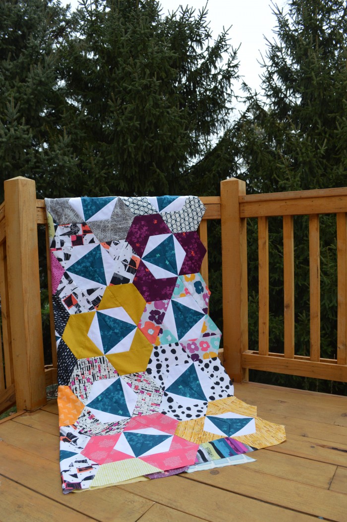 Pieced modern hexagon quilt by Sharon McConnell with Art Gallery Fabrics