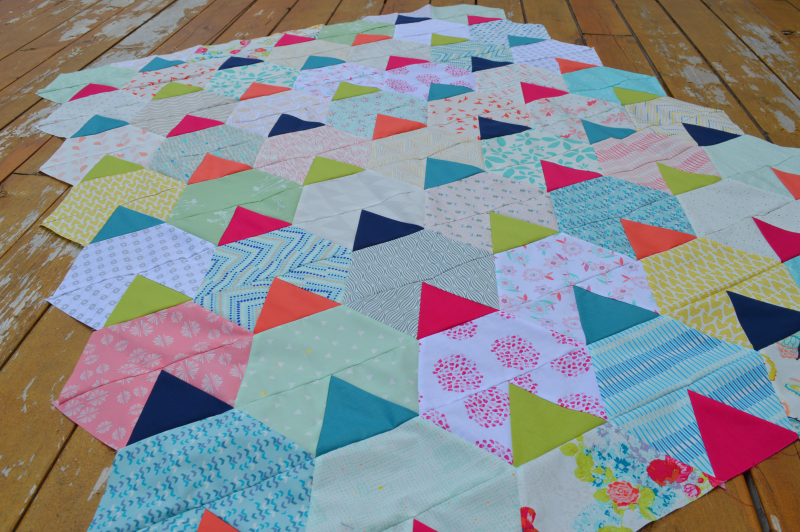 Festival quilt pattern, scrappy modern patchwork quilt by Sharon McConnell