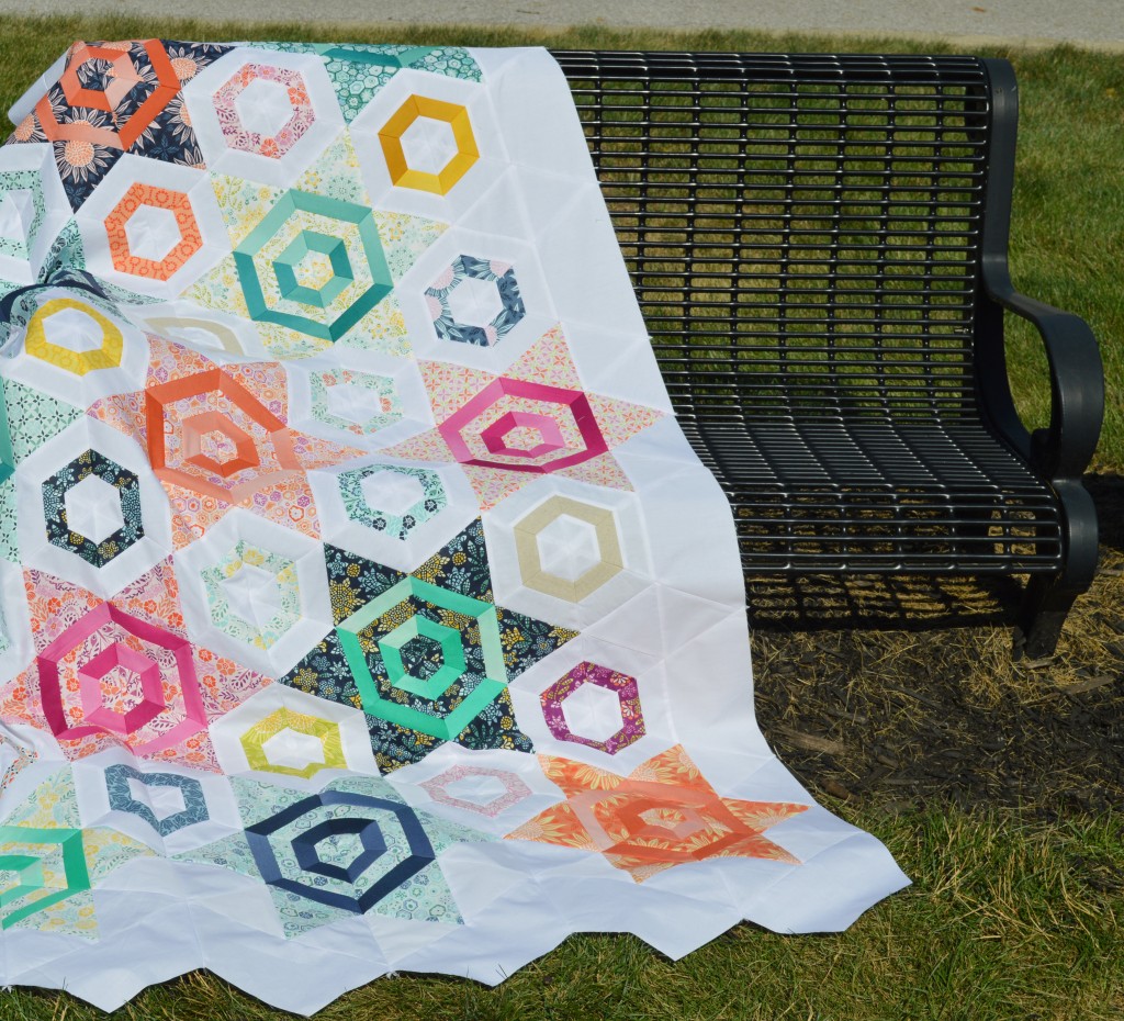 Hexagons and stars quilt by Sharon McConnell with Moda Fabrics by Kate Spain