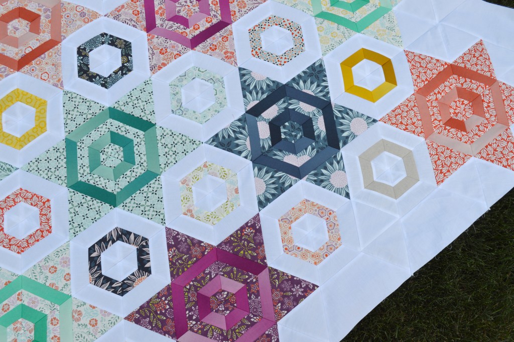 Hexagons and stars quilt by Sharon McConnell with Moda Fabrics by Kate Spain