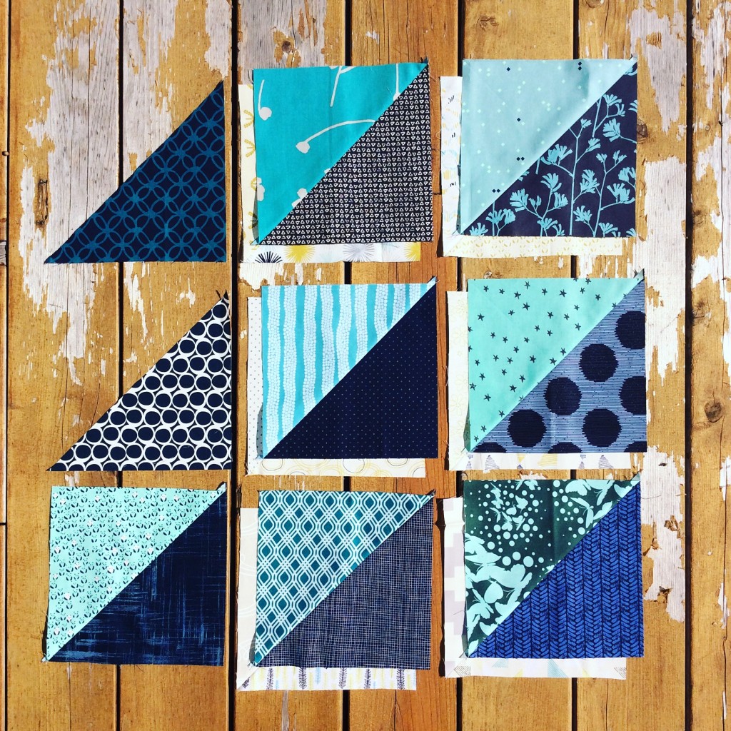 Blue quilt blocks, half square triangles