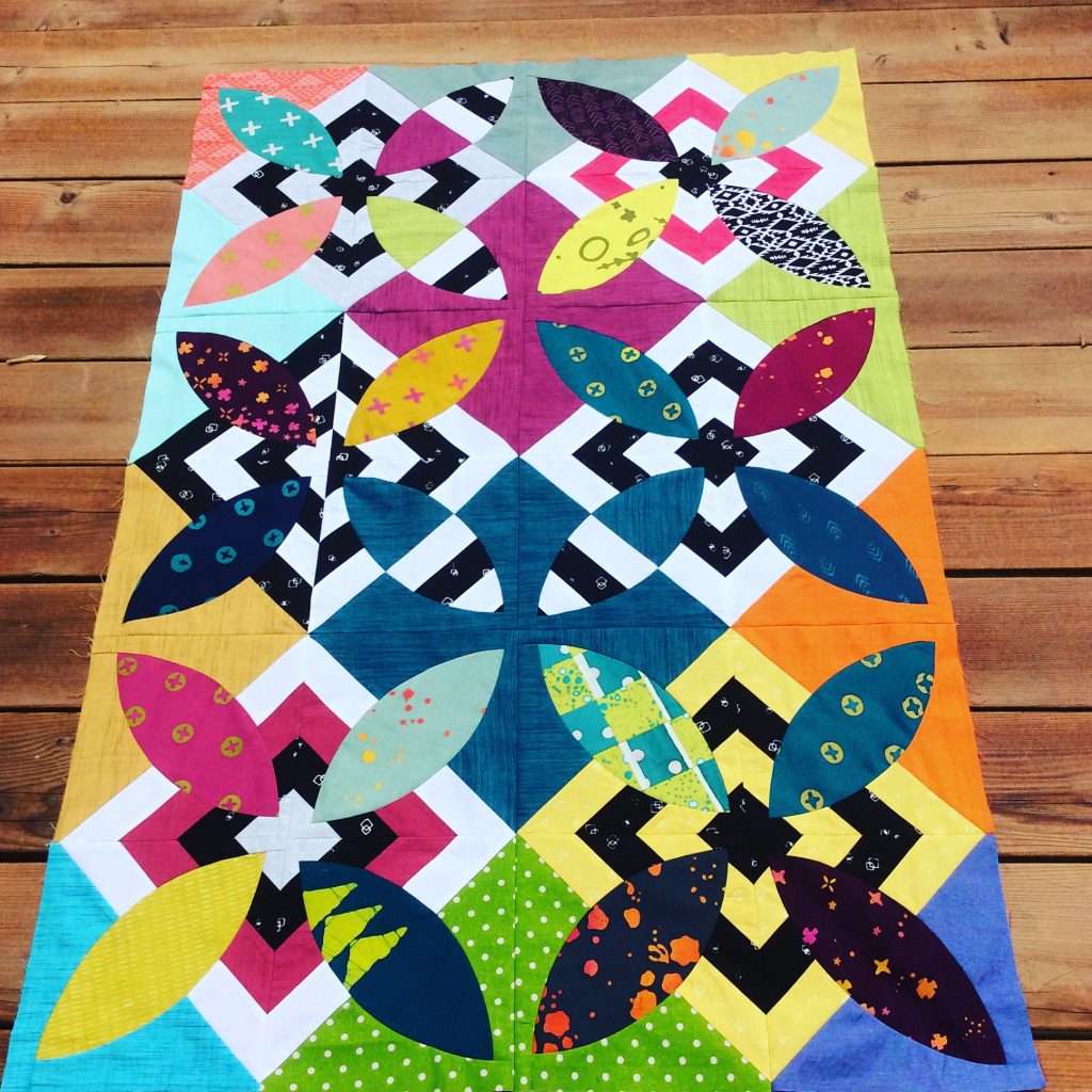 Summer Bloom quilt in progress by Sharon McConnell