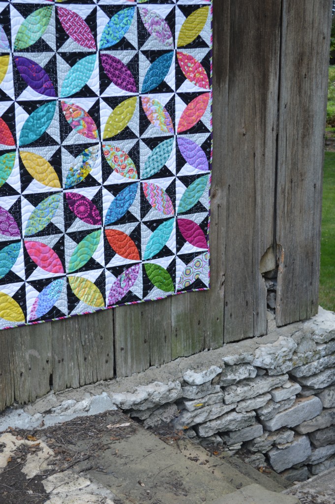 Lava beach quilt by Sharon McConnell, modern curved piecing orange peel quilt