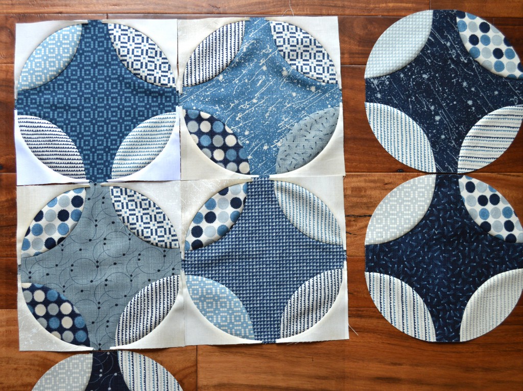 blue and white curved piecing quilt by Sharon McConnell