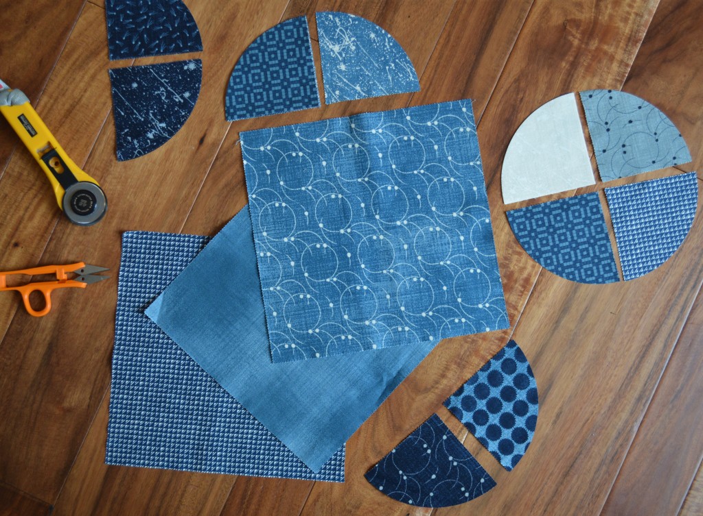 blue and white curved piecing quilt by Sharon McConnell