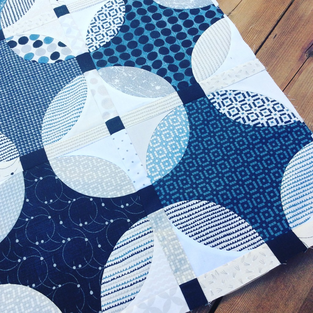 indigo quilt design by Sharon McConnell with curved piecing and Moda Fabrics