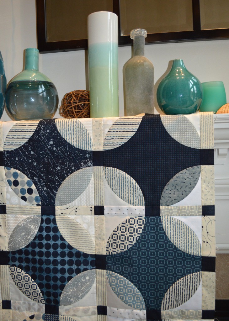 indigo quilt design by Sharon McConnell with curved piecing and Moda Fabrics