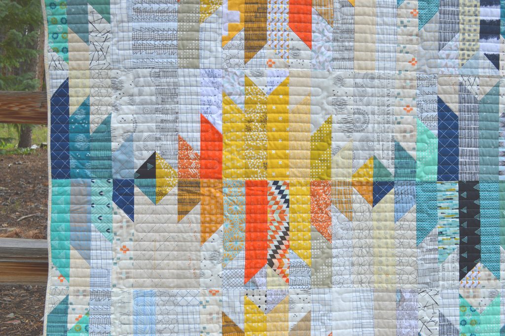 wavelength quilt by Sharon McConnell in American Patchwork and Quilting magazine, modern quilt with strips and scraps