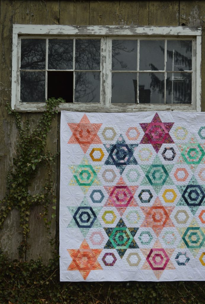 Aurora Quilt, hexagon star pattern by color girl sharon mcconnell, with fabrics by Kate Spain for Moda fabrics