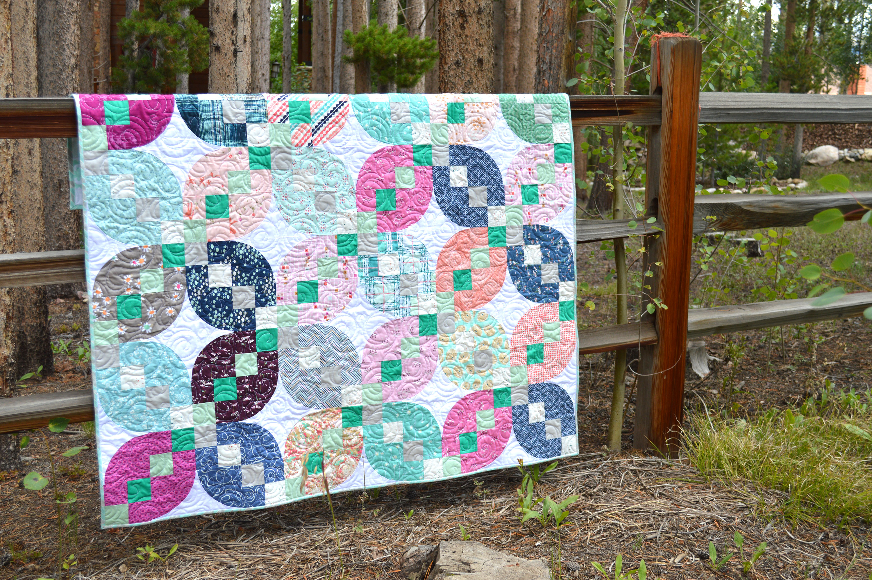 four patch petals quilt by Sharon McConnell in Quilts and More magazine with Art Gallery Fabrics