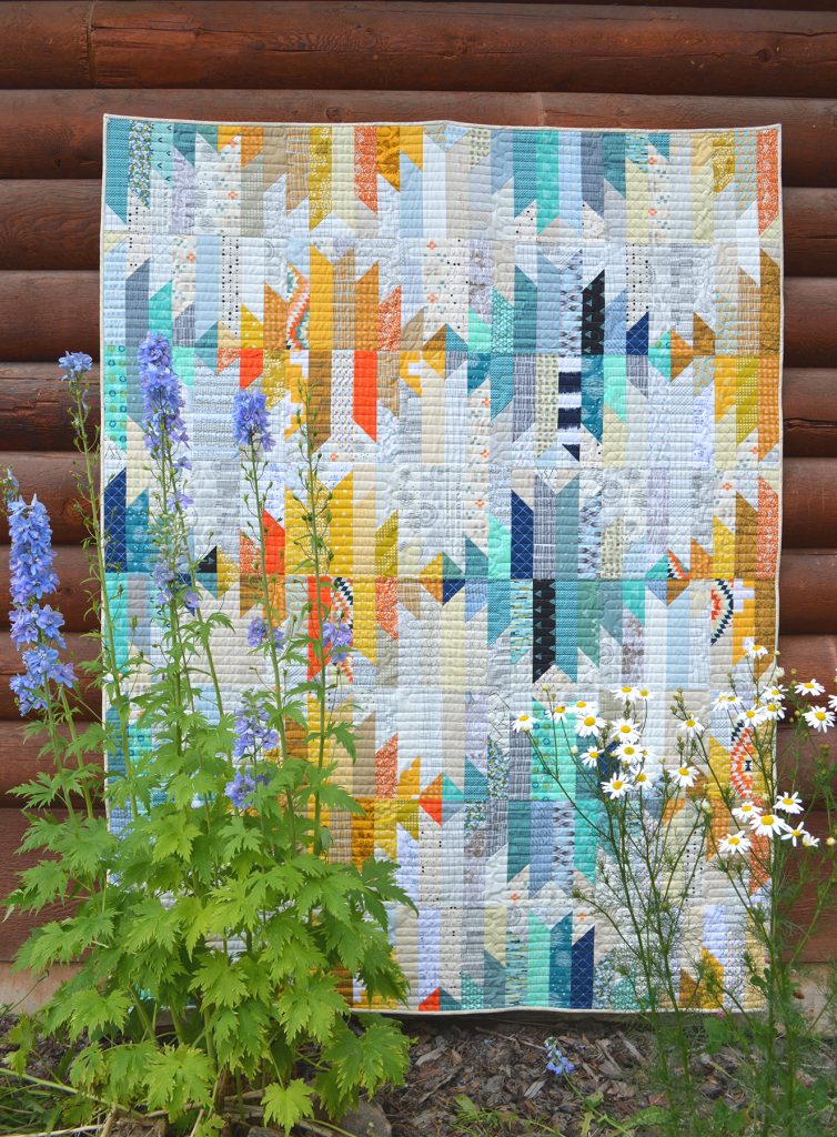 wavelength quilt by Sharon McConnell in American Patchwork and Quilting magazine, modern quilt with strips and scraps