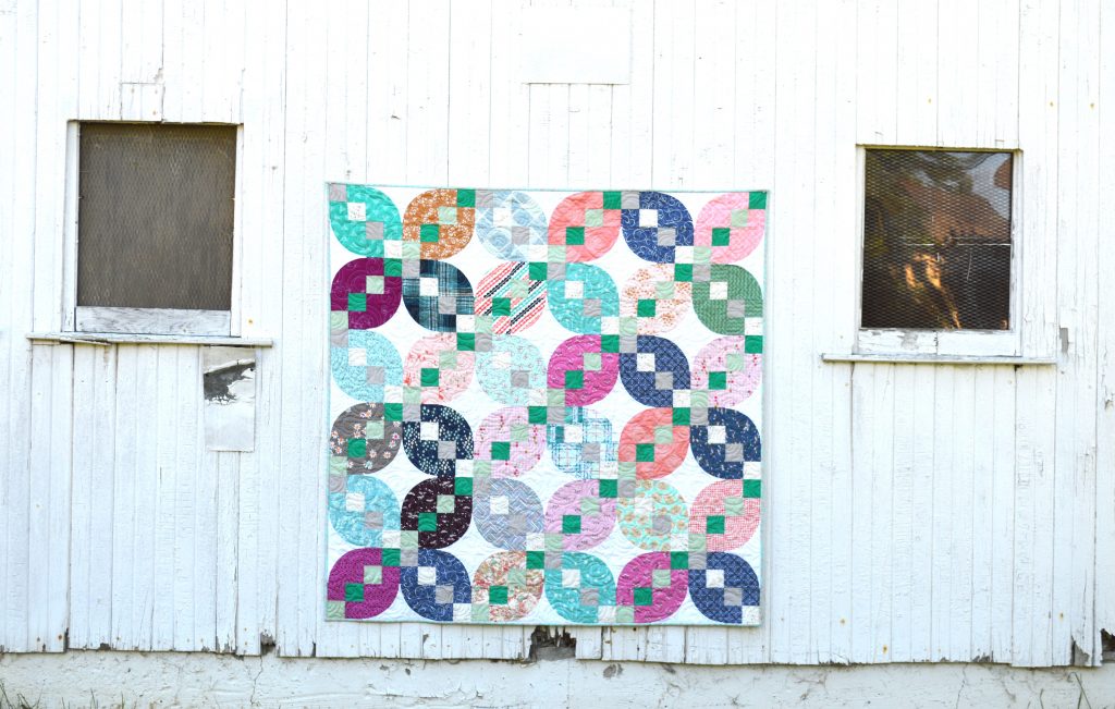 four patch petals quilt by Sharon McConnell in Quilts and More magazine with Art Gallery Fabrics