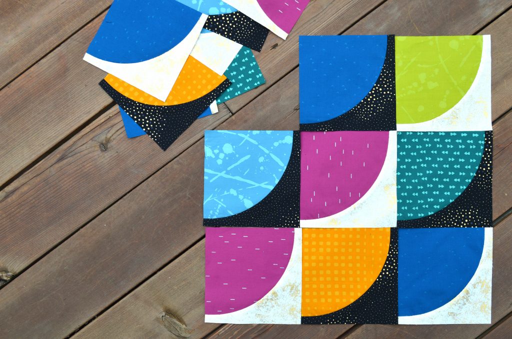 Drunkards path quilt blocks, modern curved piecing quilt with batik fabrics