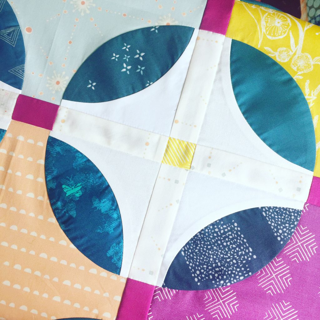 Curved piecing quilt with the Classic Curves Ruler by Color Girl Quilts, with art gallery fabrics