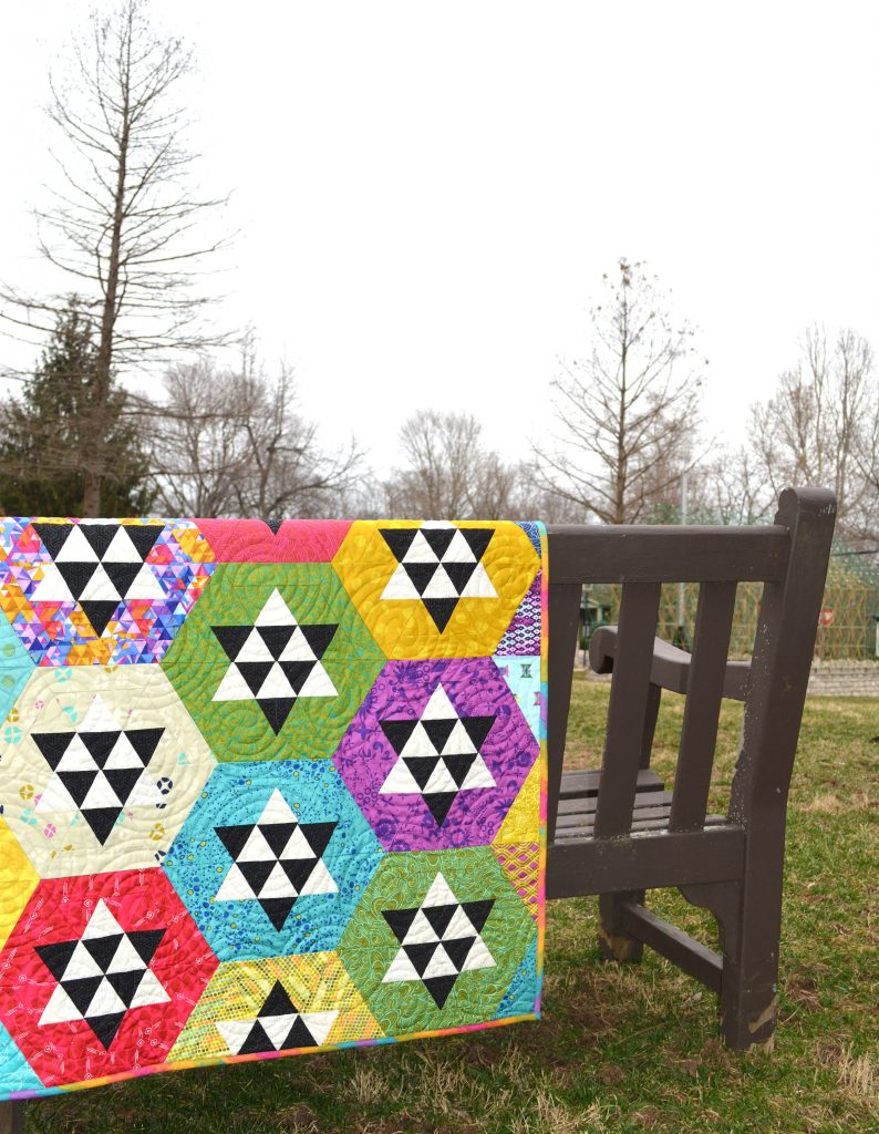Hexagon and star quilt by Sharon McConnell in Modern Quilts Unlimited Magazine