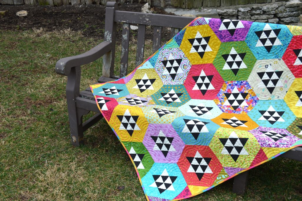 Hexagon and star quilt by Sharon McConnell in Modern Quilts Unlimited Magazine