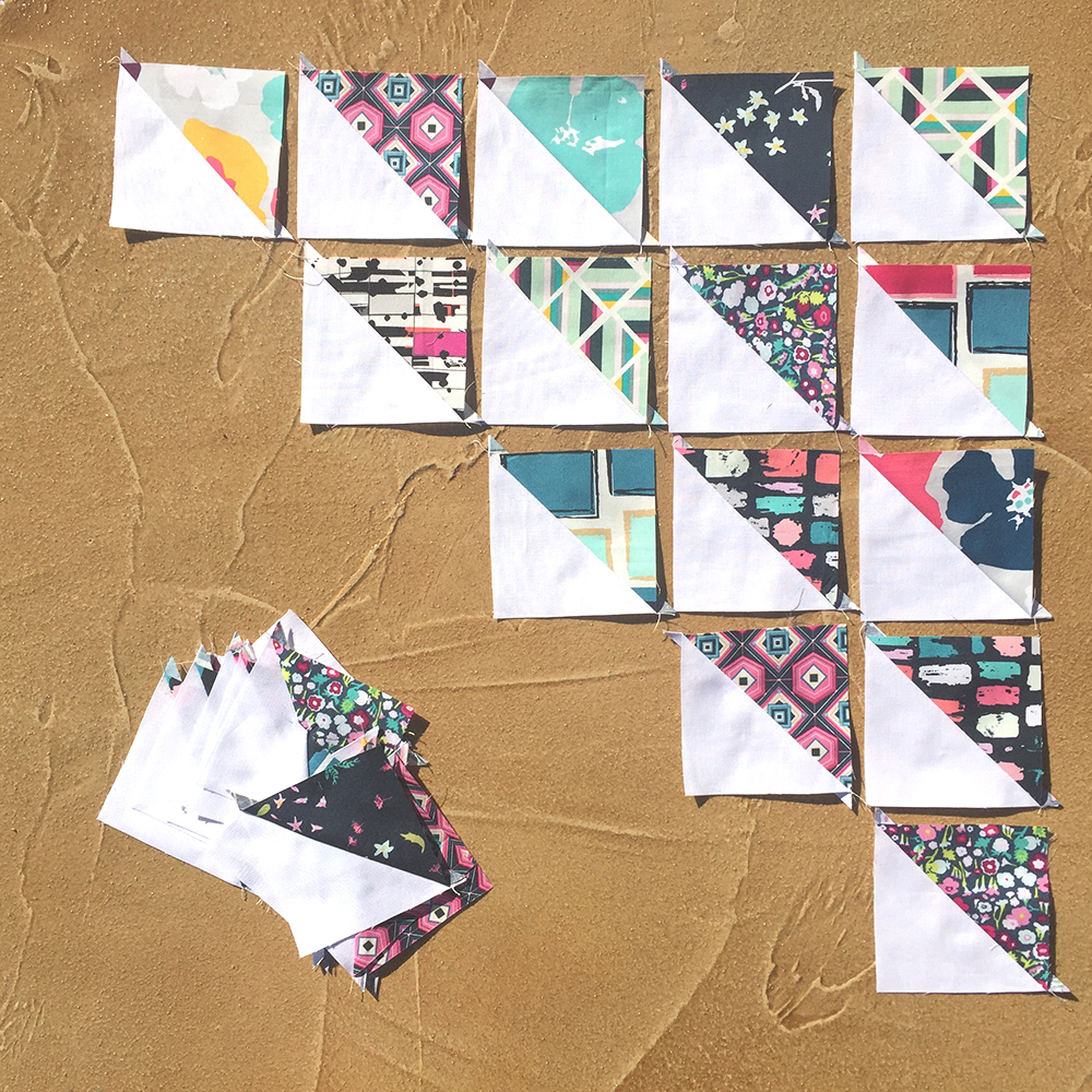 Half square triangle blocks with Art Gallery Fabrics for Pixie Medallion quilt along