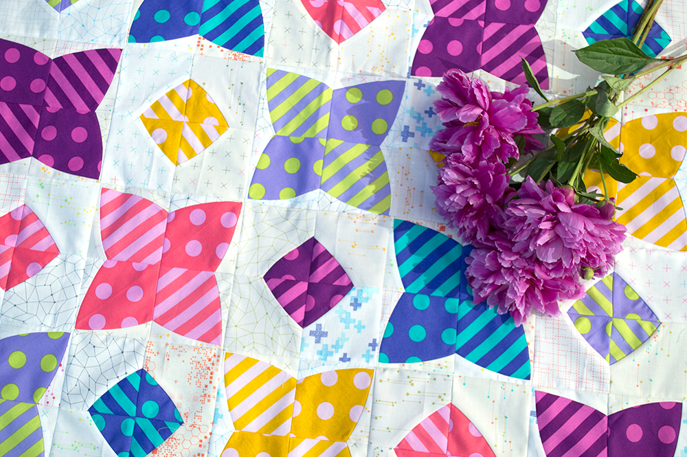Pom Pom quilt by Sharon McConnell using Tula Pink polka dots and stripes fabrics