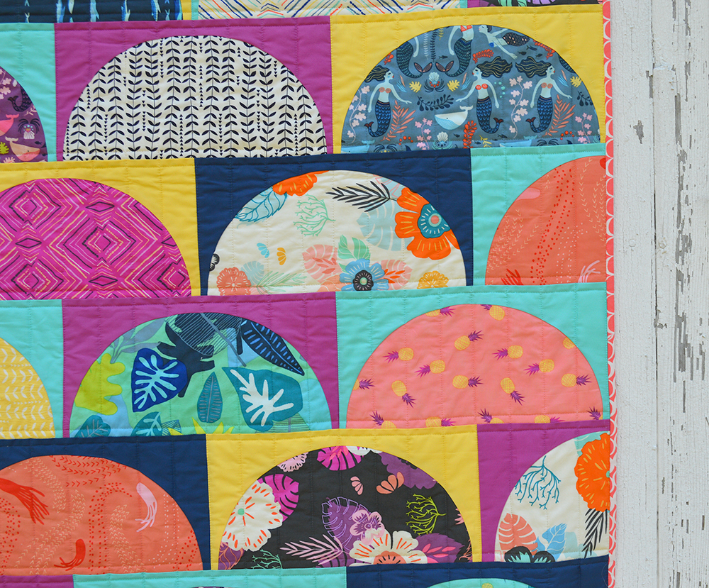 Curved piecing Sirena quilt by Sharon McConnell using Sirena fabrics by Art Gallery FAbrics