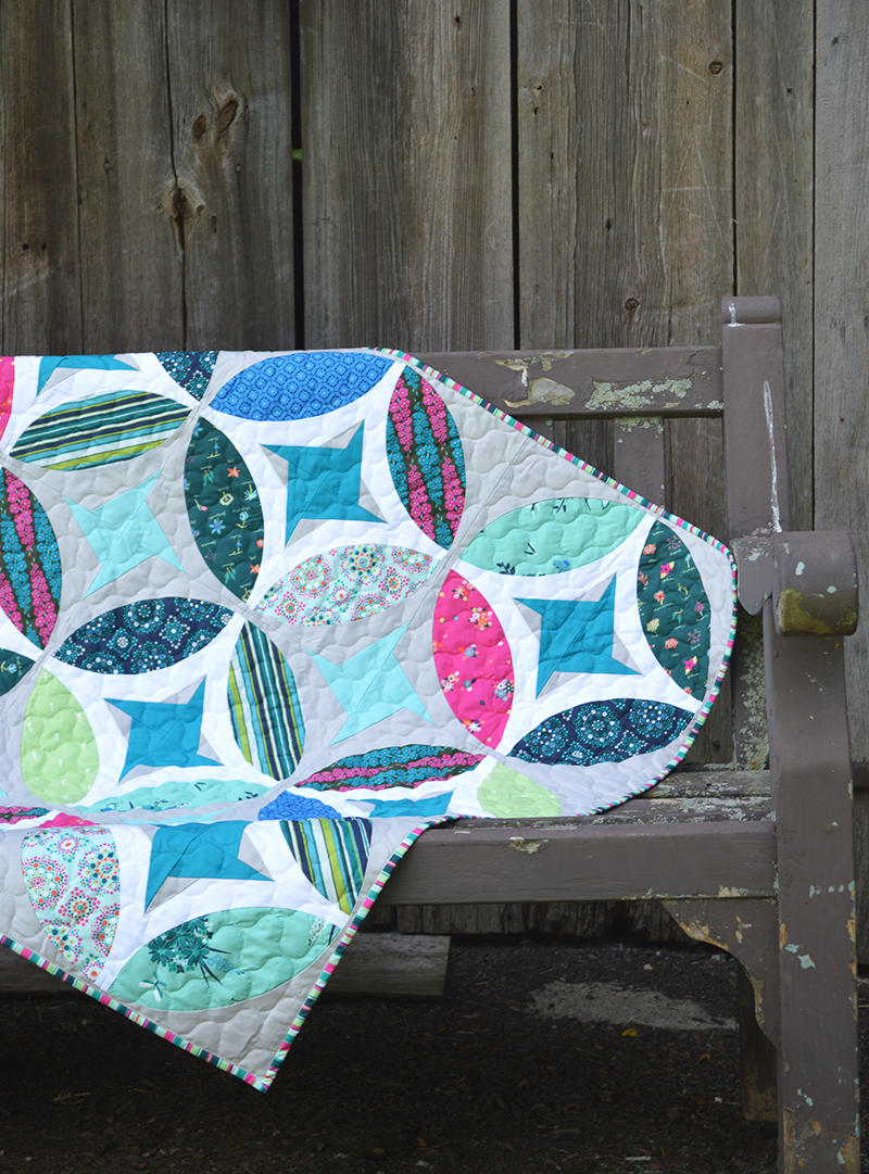 Eclipse quilt by Color Girl Quilts, with the Classic curves Ruler and Art Gallery Fabrics.