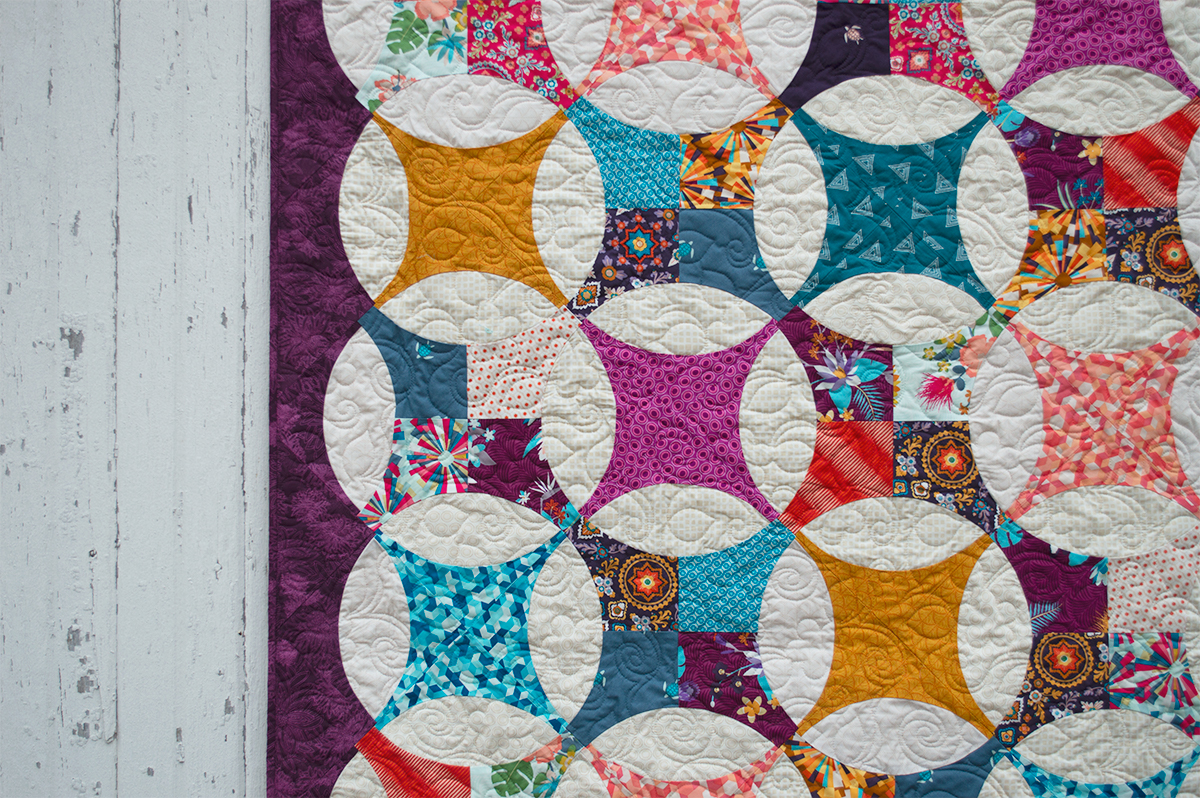 Bloom Quilt, modern flowering snowball quilt by Color Girl Quilts with Aura fabrics