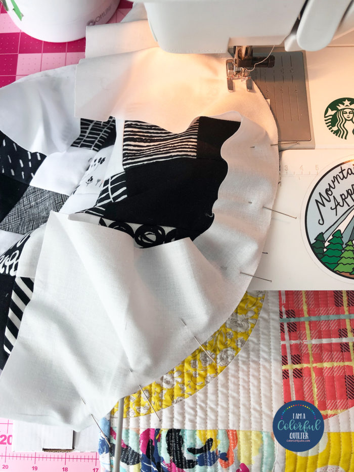 circle set in curved piecing by Color Girl Quilts