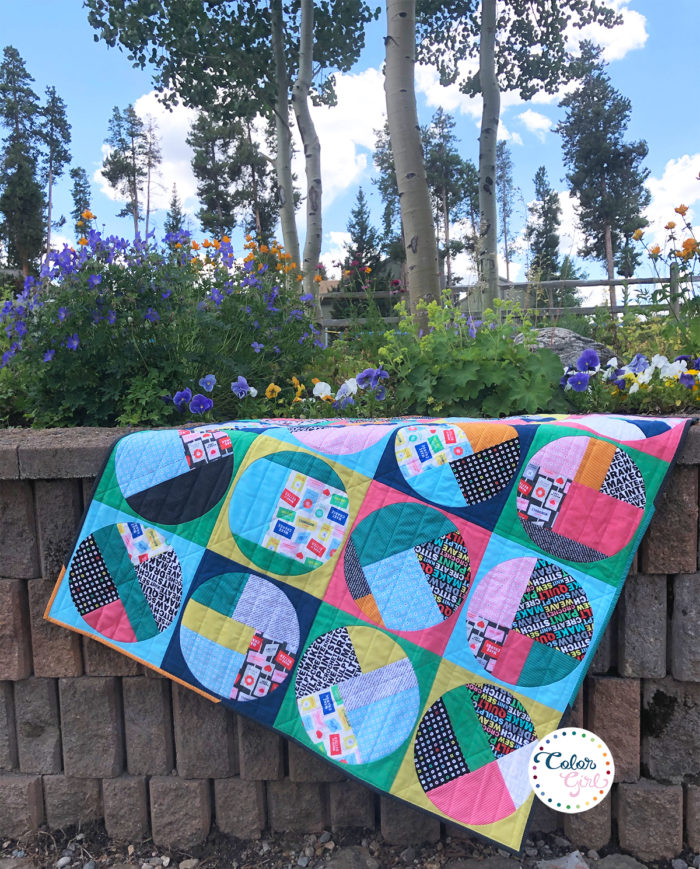 Uppercase fabrics by Windham Fabrics, scrappy circles quilt by Sharon McConnell