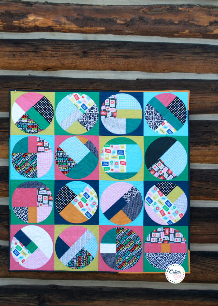 Uppercase fabrics by Windham Fabrics, scrappy circles quilt by Sharon McConnell